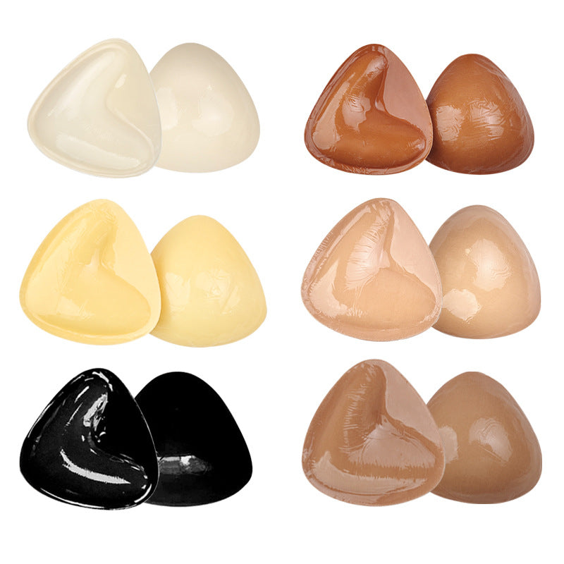 Double-sided adhesive bra inserts for push-up and breast lift.