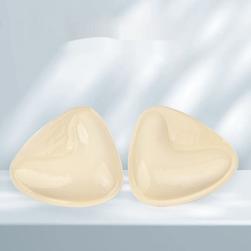 Double-sided adhesive bra inserts for push-up and breast lift.