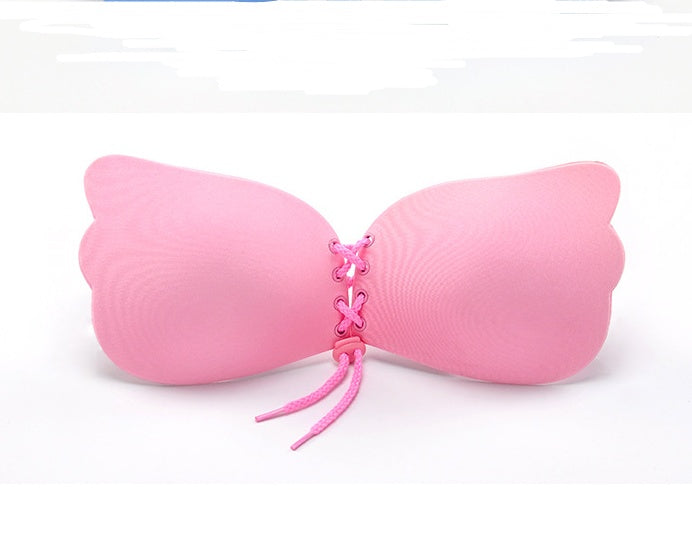 Large-size strapless adhesive push-up bra for women.