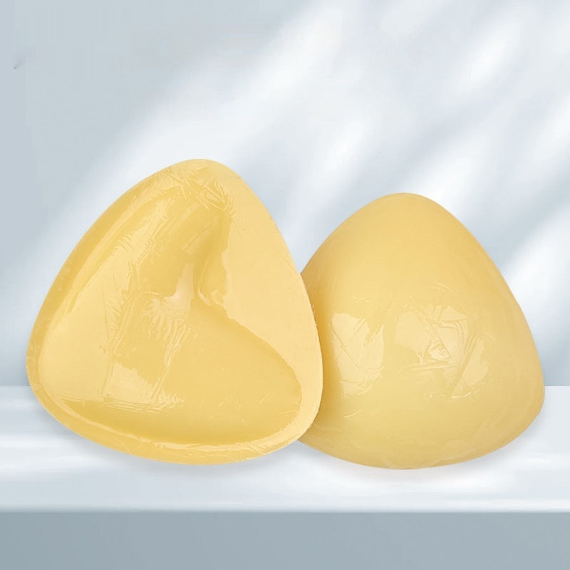Double-sided adhesive bra inserts for push-up and breast lift.
