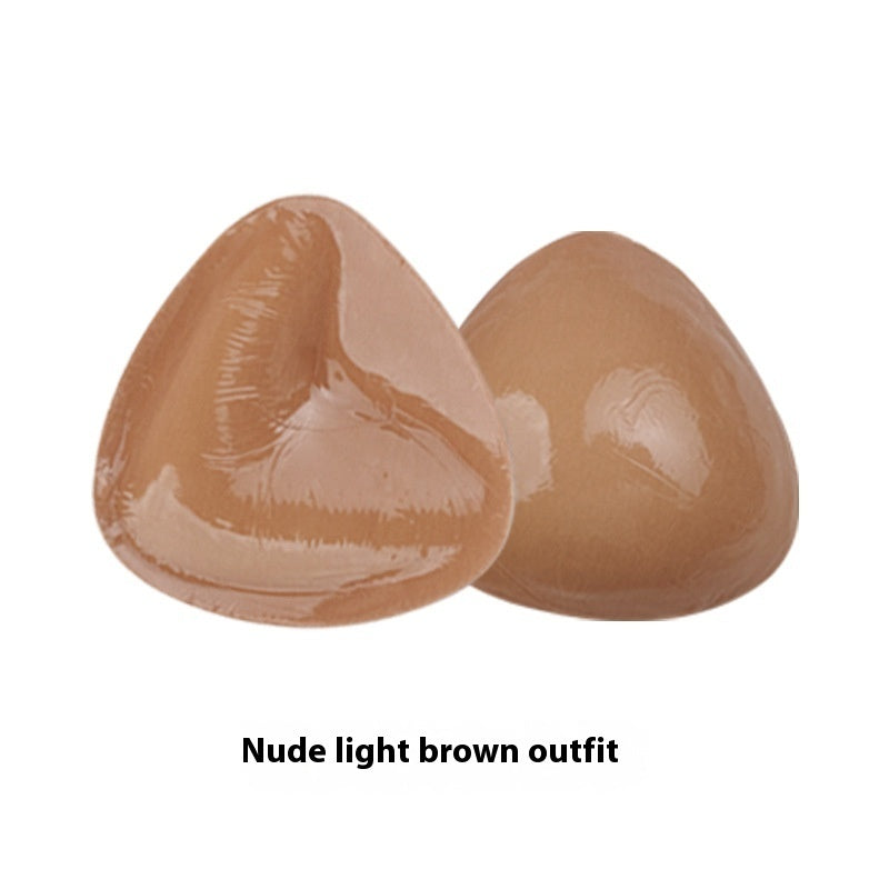 Double-sided adhesive bra inserts for push-up and breast lift.