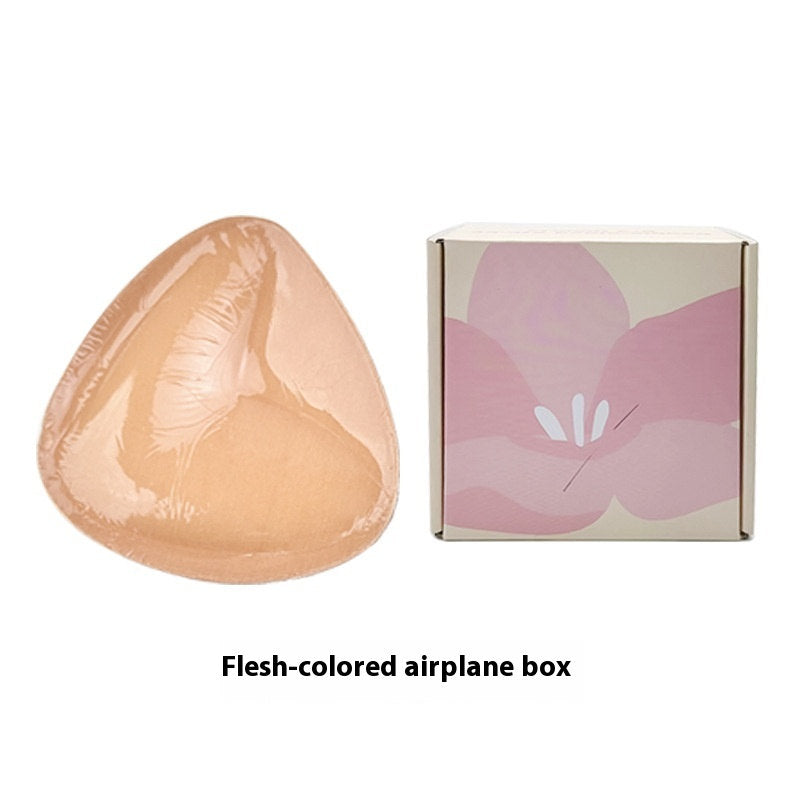 Double-sided adhesive bra inserts for push-up and breast lift.