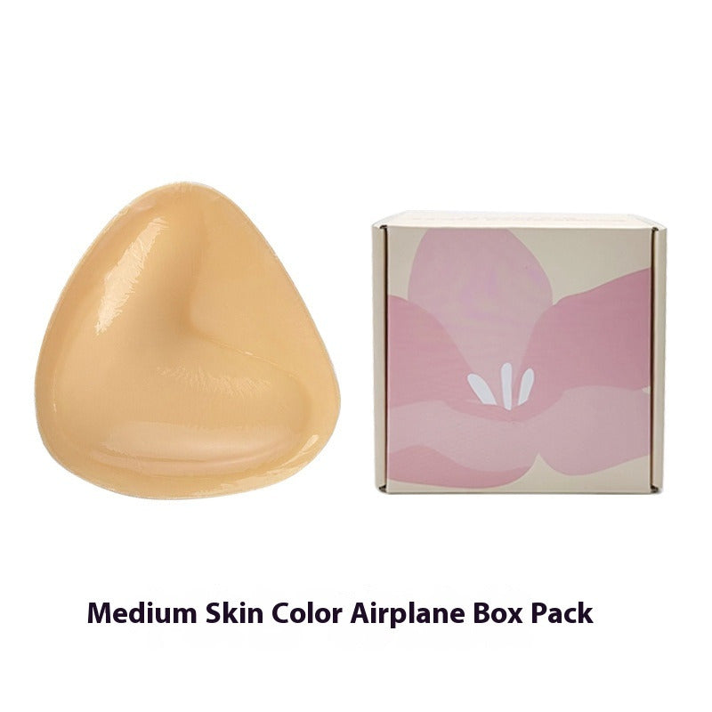Double-sided adhesive bra inserts for push-up and breast lift.