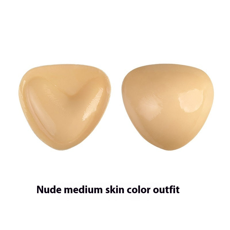 Double-sided adhesive bra inserts for push-up and breast lift.