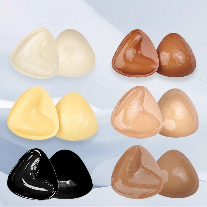 Double-sided adhesive bra inserts for push-up and breast lift.